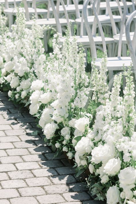 Floral Lined Aisle with beautiful white roses, larkspur, stock and greenery. Location Loriana in San Luis Obispo. Floral Lined Aisle, Arbour Florals, Head Table Flowers, Aisle Arrangements, White Wedding Ceremony, Ceremony Florals, Wedding Isles, Ceremony Aisle, Aisle Flowers