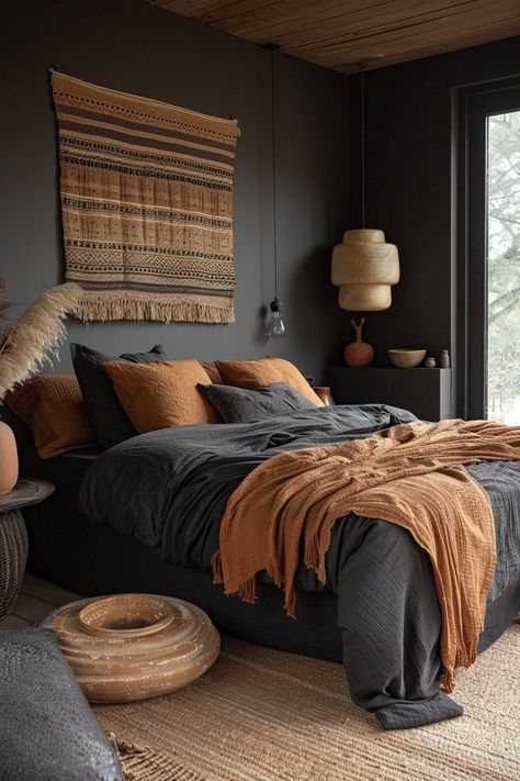 29 Black Bedroom Ideas for a Bold and Sophisticated Space 25 Rust Room Aesthetic, Black And Amber Bedroom, Beige Moody Bedroom, Fall Bedroom Decor Black Bed, Gray And Clay Bedroom, Black And Cinnamon Bedroom, Moody Burnt Orange Bedroom, Bedroom With Rust Bedding, Charcoal And Rust Bedroom