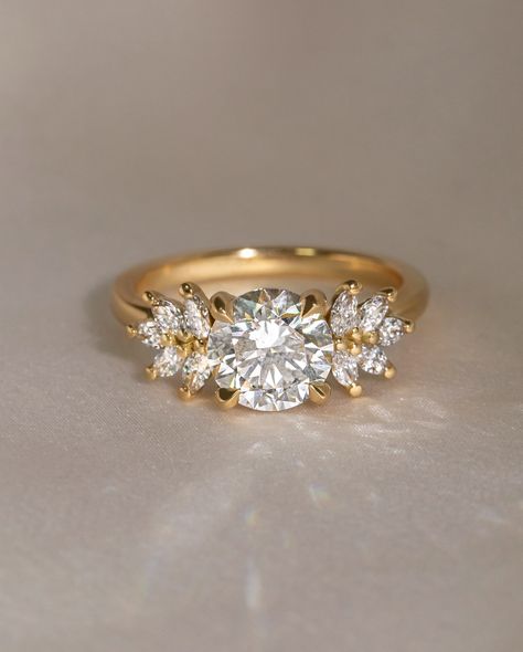 We're all obsessed with the Anastasia 💛👑 #roundcut #anastasiaring #diamondring #engaged #engagementring #ringsofig Luxury Three Stone Diamond Promise Ring, Luxury Three-stone Cluster Ring As A Gift, Victorian Gold Three-stone Ring, Exquisite Three-stone Round Ring, Luxury Victorian Three-stone Diamond Ring, خواتم خطوبة, Cluster Engagement Ring, Round Cut, Diamond Ring