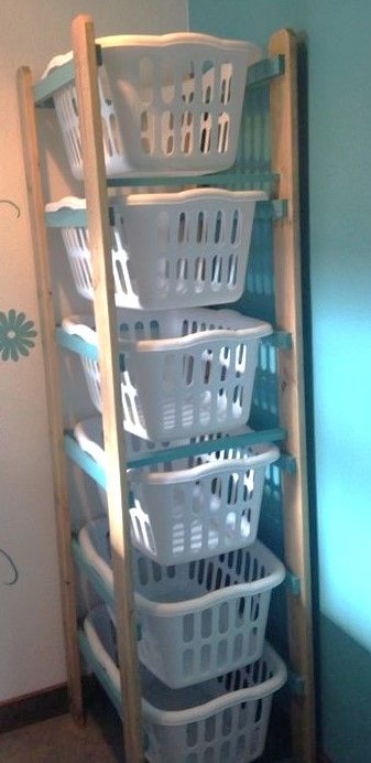 Laundry Hamper Tower Diy, Diy Clothes Organizer Storage Ideas Laundry Baskets, How To Build A Laundry Basket Holder, Laundry Room Ideas Baskets, Diy Vertical Laundry Sorter, Laundry Basket Stacker, Laundry Basket Shelf Plans, Diy Laundry Sorter Small Spaces, 4 Tier Laundry Basket Holder Diy