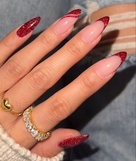 Red Nails New Years Eve, Almond Nails Festive, Red Sparkle Nails Acrylic Christmas, Glitter Red Almond Nails, Gliterry Nails Design French Tip, Red Prom Nails Acrylic Almond, Red With Sparkle Nails, Sparkle Red French Tip Nails, Christmas Nails Acrylic 2024