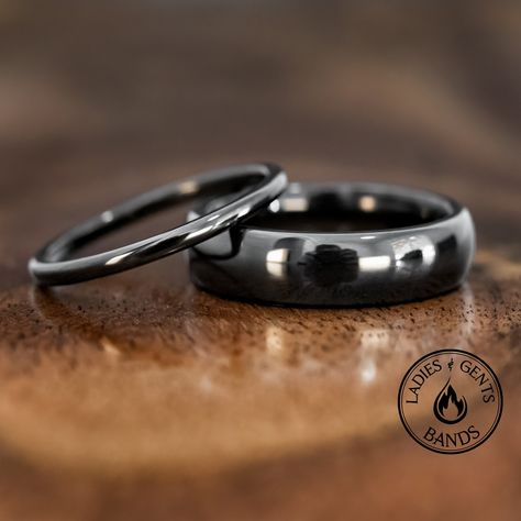 Your wedding ring set order includes + One 6mm Black Polished obsidian tungsten Wedding Band + One 2mm Black Polished obsidian tungsten Wedding Ring + Both Come inside Wax Sealed Ring Boxes. Limited Time: Free Matching Set of Black Silicone Bands w/ Order. *Durable - Incredibly Scratch-Resistant to always look great. *Comfort-fit & Weighty - Designed to fit well and feel good in your hand. *Made to order - Every ring we ship is unique and one-of-a-kind. *6mm - Most popular standard width for men Black Titanium Wedding Band, Black Ring Band, Tungsten Wedding Bands Women, Black Ring Wedding, Black Band Wedding Rings, Matching Black Wedding Bands, Wedding Ring Sets Black, Couple Rings Black, Black Matching Wedding Rings