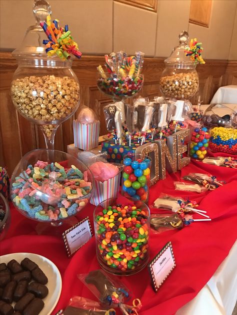 This is a first Birthday colorful candy table we made at Don Pepe Steakhouse in Pine Brook, NJ Candy Buffet Ideas Birthday, Birthday Party Candy Table, Birthday Candy Table, Diy Dessert Table, Candy Table Decorations, Budget Desserts, Candy Bar Birthday, Decorações Com Comidas, Party Sweets