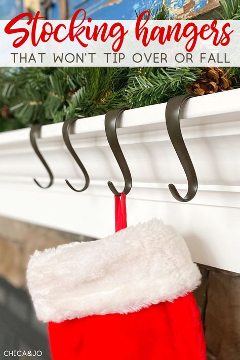 Christmas stocking hangers Christmas Stocking Holders For Mantle, How To Hang Stockings On Fireplace, Mantel Stocking Holders, Hang Stockings On Mantel, Stocking Hanger Ideas, Hanging Stocking Ideas, Hanging Stockings Ideas, Ways To Hang Stockings On Mantle, Hanging Stockings On Mantel