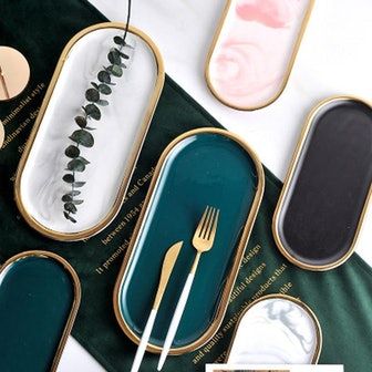 10 Art-Deco-Inspired Home Trends Designers Recommend For A Touch Of Opulence Assiette Design, Accent Tray, Ceramic Tray, Oval Tray, Colorful Ceramics, Oval Plates, Gold Ceramic, Dessert Dishes, Storage Tray