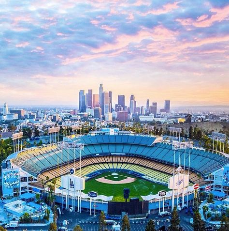 Dodger Stadium with the city of Los Angeles in the background. Let's Go Dodgers, Major League Baseball Stadiums, Dodgers Nation, Dodgers Girl, Mlb Stadiums, Baseball Park, Dodger Blue, Sports Stadium, Mount Washington