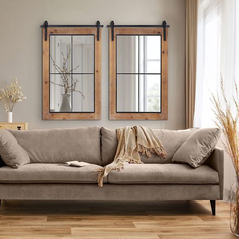 20 Best Mirrors That Look Like Windows (2022) and Buying Guide Large Wall Behind Couch Mirror, Farmhouse Mirror Behind Couch, Mirrow Above Sofa, Modern Rustic Farmhouse Living Room Lowe's, Size Of Mirror Over Sofa, Wall Behind Couch Decor, Behind Couch Decor, Decor Over Couch, Couch Wall Decor