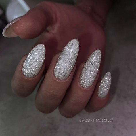 White Glittery Almond Nails, White Nye Nails, Nye Nails Almond Shape, White Sparkly Acrylic Nails, New Years Eve Nails Ideas Sparkle, White Sparkly Nails, White Sparkle Nails, Sparkly Nail Designs, Sparkly Acrylic Nails