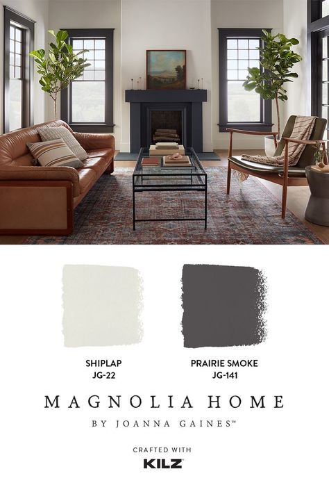 “The contrast of the dark trim and light walls brings this room to life, giving it both a traditional and a modern feel.” –Joanna Gaines. Learn how these shades came together to create a classic and cozy living room on our blog. Sunroom Dark Walls, Black Living Room White Trim, Dark Living Room Paint Color Ideas, White Walls Dark Trim Living Room, White Walls Darker Trim Living Room, Dark Trim Light Walls Bedroom, Dark Trim Around Windows, Darker Trim Lighter Walls Living Room, White Walls Dark Fireplace