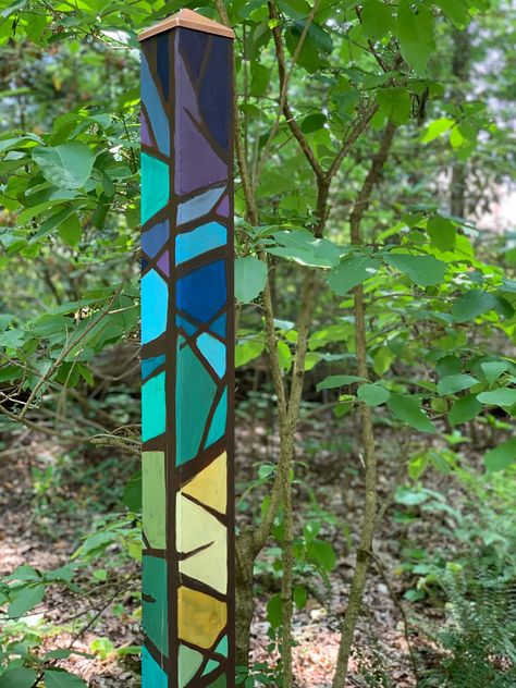 UNC Charlotte Botanical Gardens' Painted Art Pole Trail in May Peace Posts Garden, Tall Yard Art, Garden Poles Designs, Peace Poles Ideas Garden Art Diy, Painted Poles Garden Art, Garden Poles Painted Diy, Mosaic Garden Totem Poles, Peace Poles Ideas Garden Art, Painted 4x4 Posts