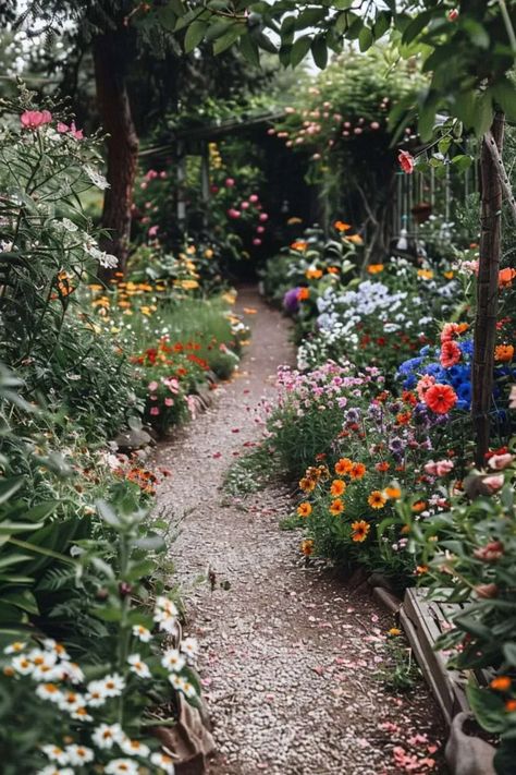 Step into the world of DIY with these inviting garden walkway ideas on a budget! Perfect for weekend warriors looking to enhance their outdoor space without breaking the bank. Discover simple materials and easy steps to create your own picturesque garden pathway. #GardenWalkway #DIYProject #BudgetFriendly Potager Garden Aesthetic, Farmhouse Garden Decor Ideas, Backyard Landscaping Wildflowers, Yard Flowers Ideas Backyards, Pathway Flower Bed, Flower Pathway Walkways, Shade Pathway Walkways, Photography Garden Ideas, Flower Garden In The Woods