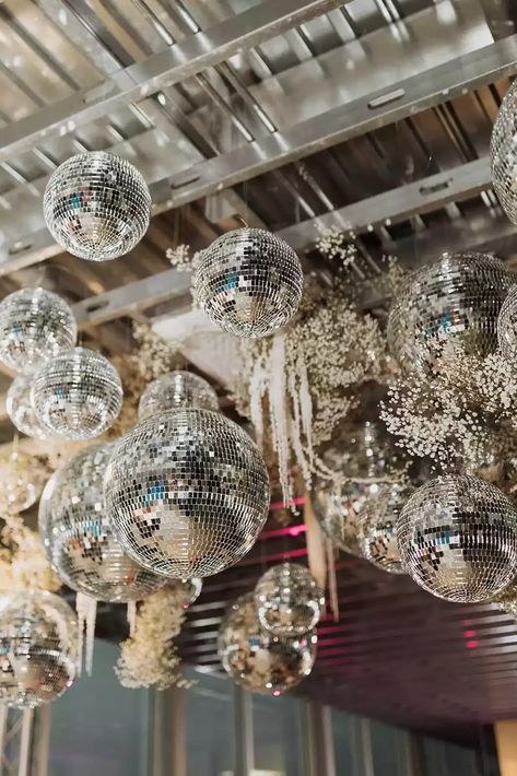 Disco balls are kind of becoming our favorite wedding décor item and this Joshua Tree wedding shows why. They paired it with baby's breath for a whimsical touch. Get all the details of this modern Joshua Tree wedding. // Photo: Sydney Noelle Photography and Coordinator: Details Darling Joshua Tree Wedding, Nye Wedding, Disco Balls, Tree Wedding, Wedding Mood Board, The Ceiling, Wedding Mood, Disco Party, Joshua Tree