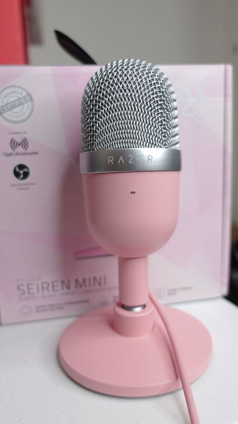 salmon pink razer seiren mini on a white desk in front of its box. Pink Microphone Aesthetic, Aesthetic Microphone, Mini Microphone, Pink Microphone, Podcast Microphone, Microphone Aesthetic, Creative Podcast, Gaming Microphone, Work Vision Board