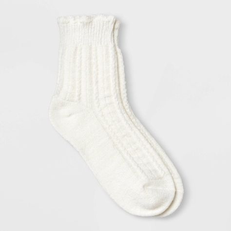 Keep your feet warm with the Women's Scalloped Edge Pointelle Supersoft Short Crew Boot Socks - Universal Thread™ 4-10. These soft socks are made from blended midweight fabric that ensure maximum comfort and warmth. With ribbed knit cuffs and a scalloped edge design, they provide a secure, snug fit that stays in place all day. Perfect for lounging at home or for pairing with boots, these essential socks are a seasonless staple for every wardrobe. Universal Thread™: Found exclusively at Target. Target Christmas Socks, Cute Winter Socks, Fatface Socks, Cute White Socks, Socks Png, Essential Socks, White Crew Socks, Beige Socks, Sock Collection