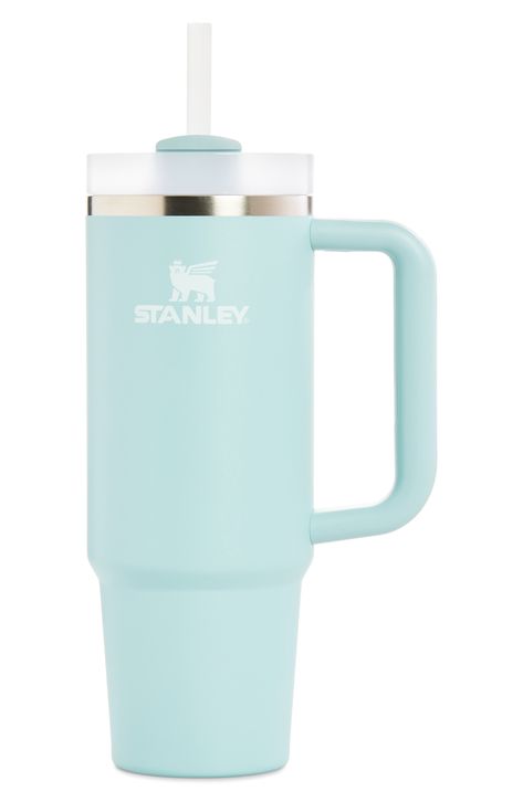 Hit your daily hydration goals with style and ease using Stanley's fan-favorite 30-ounce Quencher Travel Tumbler.What it does: Made from stainless steel with double-wall vacuum insulation, this tumbler helps keep liquids cold for hours on end. The tumbler will keep ice for up to two days, keep your drinks cold for up to 11 hours and keep your drink hot for up to seven hours.Additional features: The three-position lid features an opening for a straw, an opening for sipping and a full-cover top th Water Bottles Stanley, Decorated Stanley Cup, Small Stanley Cup, Cute Water Bottles Aesthetic, Baby Pink Stanley, Stanley Excessories, Preppy Water Bottle, Standly Cups, Cute Stanley Cups