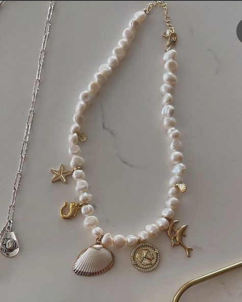 Shells in the summer? Groundbreaking….😉 The Shells & Pearls Charm Necklace is live on the website 🐚 Shells, summer jewelry, charms, charm necklace 27 Birthday, Shell Charm Necklace, Pearl Charm Necklace, 27th Birthday, Charms Necklace, Birthday Weekend, Jewelry Charms, Cute Diys, Pearl Charms