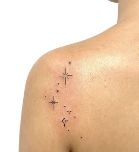 Tiny Twinkle Tattoo, Stars And Sparkles Tattoo Design, Star Tattoos On Back For Women, Star And Sparkle Tattoo, Small Sparkle Star Tattoo, Stars Around Words Tattoo, Sparkle Flash Tattoo, Sparkle Star Tattoo Design, Line Stars Tattoo