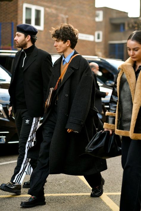 Layers of grey and black styled with chunky Gucci loafers | Best street style from London Fashion Week Men’s AW20 | British GQ Street Style Autumn, London Fashion Week Mens, Black Overcoat, Men's Street Style, London Fashion Week Street Style, Gucci Loafers, Wool Overcoat, Straight Cut Jeans, Coat Style