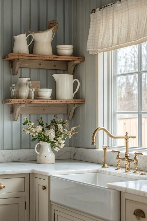 Embrace rustic charm with the latest kitchen design featuring vintage shelving and warm gold accents. Ideal for creating a cozy, farmhouse vibe! #KitchenDecor #ModernRustic #HomeTrends Farm Chic House, Cute Farmhouse Interior Design, Cozy Chic Kitchen, Neutral Vintage Kitchen, French Style Farmhouse, English Country Interior Design Style, French Farmhouse Kitchen Backsplash, Thrifted Farmhouse Decor, Small Cottage Home Interior