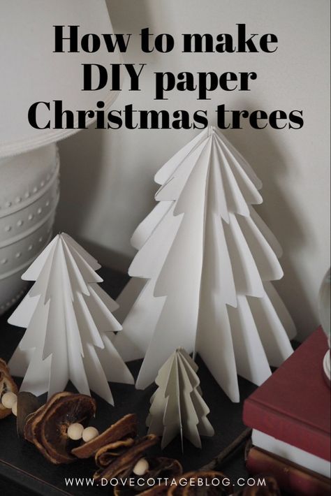 How to make DIY paper christmas trees - simple budget friendly tutorial for creating scandi-style christmas decor. Easy christmas craft idea #christmasdecor #christmastree #christmascraft Very Easy Christmas Crafts, Cute Simple Christmas Decor, Christmas Budget Decor, Paper Tree Decorations Christmas, White Paper Christmas Tree, Simple Paper Christmas Decorations, Scandi Xmas Decor, Diy Christmas Tree Decorations Paper, Christmas Wall Decor Diy Paper