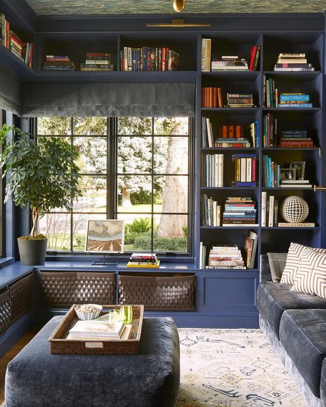 Friday afternoons call for a cozy corner and a good book! 📚✨  We are captivated by this serene home library, where blue built-in bookshelves create a striking backdrop for endless stories and adventures. The rich blue tones provide a calming atmosphere, making it the perfect spot to unwind after a long week.  Thank you for the inspiration! Design: @robertpassal Blue Library Aesthetic, Navy Library, Blue Library, New York Interior Design, Library Rooms, All About Books, Comfy Office Chair, Library Space, New York Interior