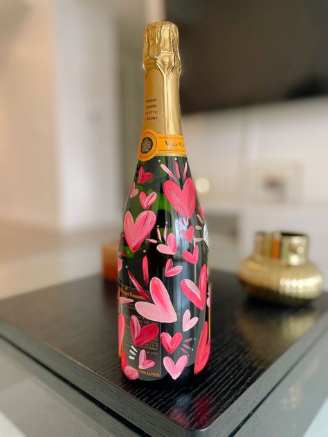 Painted Champagne Bottles | IG: @nat.just.ink | Personalized items |Artist Wine Bottle Crafts Decoration, Painting Bridal Shower Party, Handmade Bridesmaid Gifts, Engagement Box For Bride, Bridal Shower Painting, Bridesmaid Gift To Bride, Engagement Gifts Diy, Painted Bottles Ideas, Diy Bride Gifts