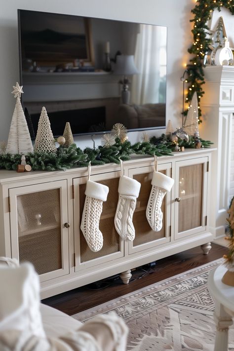 19 Small Apartment Christmas Decor Ideas For Every Room Christmas Cabinet Top Decor, Christmas Stockings Apartment, Christmas Home Decor Apartment, Cute Christmas Decoration, Decorating My House For Christmas, Holiday Decor For Small Apartment, Christmas Decoration For Apartment, Christmas Console Table Decor Under Tv, New Year Living Room Decor