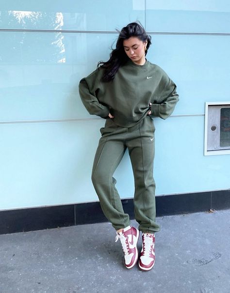 Nike mini swoosh oversized jogger in khaki | ASOS Logos, Nike Tracksuits Woman, Nike Joggers Outfit Women, Nike Tracksuit Outfit Women, Nike Tracksuit Outfit, Nike Track Pants Outfits, Nike Joggers Outfit, Nike Tech Joggers, Nike Suit