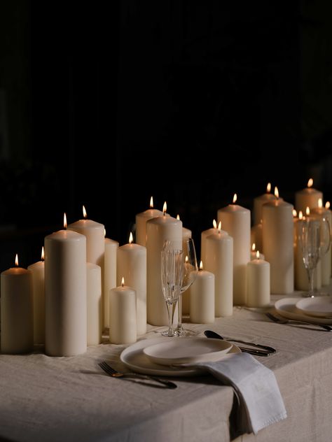 A beautiful monotone candle setting for an understated & impactful tablescape- Curated by The Hosting Company Candlescapes Decorating Ideas, Candlelight Table Setting, Table Full Of Candles, White Table Decor Christmas, Minimal Winter Wedding, Lots Of Candles Wedding, Winter Candle Ideas, Table Settings Candles, Candle Tablescapes Wedding