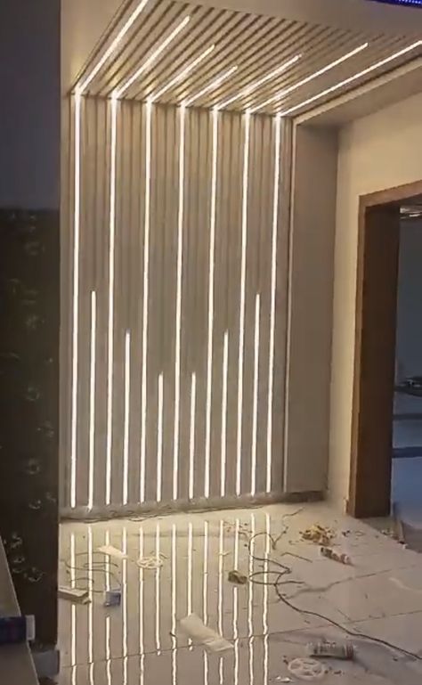 Led strip lights and profiles come in many shapes, sizes, and depths, and can be installed in different ways on Louvers With Profile Light, Panel Lights Ceiling Living Room, Slat Wall Led Lighting, Wood Paneling With Led Lights, Led Strip Lights On Wall, Profile Light Living Room, Light Panels Wall, Living Room Profile Light, Indirect Ceiling Lighting