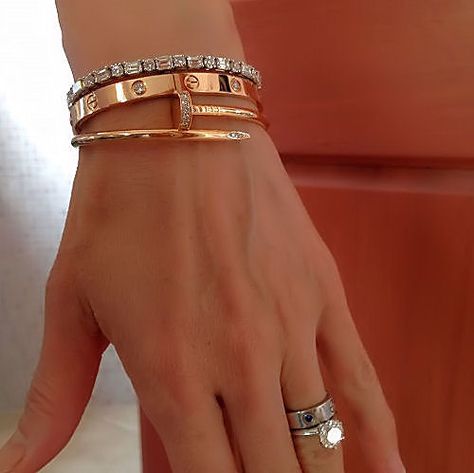 Click this image to show the full-size version. Jewelry Cartier, Jewelry Layering, Cartier Jewelry, Jewelry Luxury, Stacked Jewelry, Cartier Love Bracelet, Jewelry Inspo, Love Bracelets, Cosmopolitan