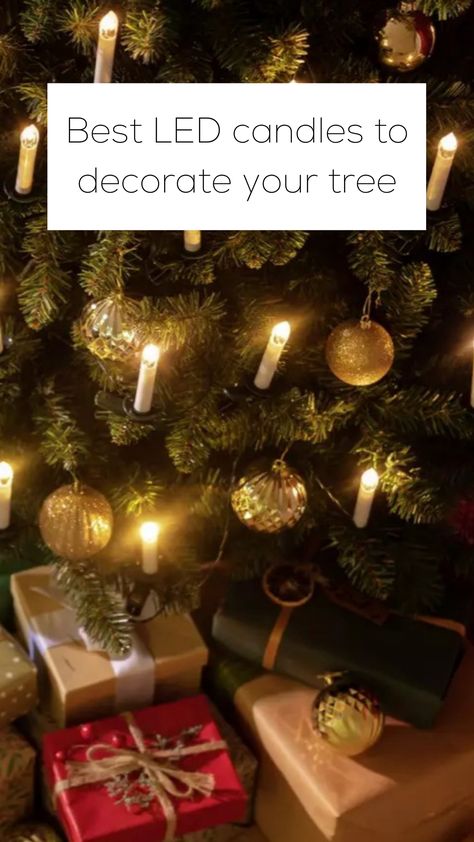 LED candle lights on traditional festive Christmas tree Candlelit Christmas Tree, Christmas Tree Candle Lights, Candles For Christmas Tree, Candles In Christmas Tree, Diy Christmas Tree Candles, Christmas Trees With Candles, Christmas Tree With Candle Lights, Christmas Tree With Candles, Candles On Christmas Tree