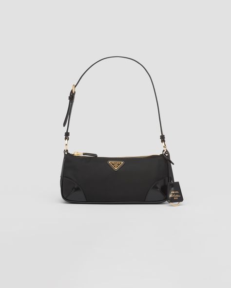 Black Re-Edition 2002 Re-Nylon and brushed leather shoulder bag | PRADA Prada Gifts, Prada Re Edition, Prada Collection, Prada Shoulder Bag, Prada Nylon, Leather Keyring, Heathrow, Triangle Logo, Leather Key