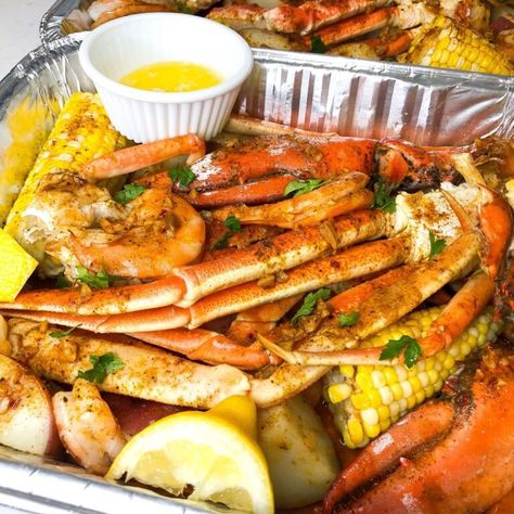 Easy Seafood Bake - There's Food at Home Baked Crab Boil Recipe, Seafood Boil Sheet Pan, Crab Boil Oven Recipe, Baked Fish And Shrimp Recipes, Baked Crab Boil, How To Cook Crab Legs At Home In Oven, Oven Crab Boil, Crab Boil In Oven, Baked Snow Crab Legs Oven