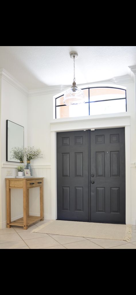 Entryway makeover by doing shiplap, chair rail, designing and building a custom entry table, and painting the window, door and door threshold black. #entryway #diytable #diyhomeprojects Chair Rail Entryway Foyers, Shiplap Chair Rail, Black Entryway, Entryway Makeover, Door Thresholds, Foyer Entryway, Diy Entryway, Chair Rail, Window Door