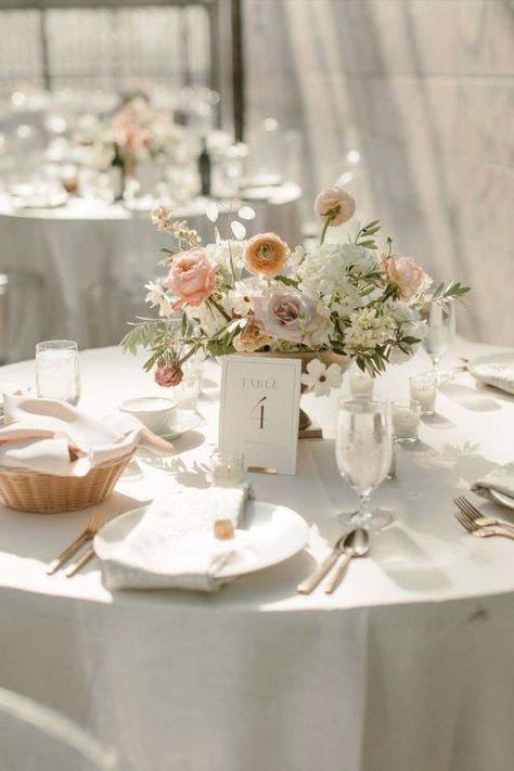 Romantic wedding tablescape featuring elegant table number cards & centerpieces in pastel hues | Midwest wedding, Omaha wedding planning, Nebraska wedding planner, luxury wedding planner, wedding inspo, wedding ideas, wedding reception decor, summer wedidng inspo, wedding tablescapes, wedding table decor, wedding table setting, wedding table centerpieces, wedidng menu, wedding stationery, wedding linens, modern romantic wedding, outdoor wedding, pink wedding theme, wedding details, dinner ideas Wedding Table Centerpieces Summer, April Wedding Flowers Centerpieces, Wedding Table Flowers And Candles, Blush Pink Wedding Table Decor, Wedding Table Circle, Summer Wedding Floral Centerpieces, Pastel Table Setting Wedding, Wedding Table Decor Round Tables, Wedding Table Setting Ideas Elegant