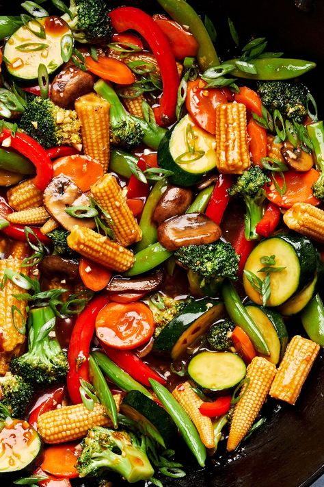 We love this easy veggie stir fry for its delicious homemade sauce and super customizable ingredient list. Make a pot of rice, and dinner is served! Veggies For Stir Fry, Best Stir Fry Vegetables, How To Cook Stir Fry Vegetables, Recipes With Stir Fry Vegetables, Healthy Asian Stir Fry, Vegan Veggie Stir Fry, Stir Fries Vegetables, Dinner Full Of Veggies, Asian Style Stir Fry