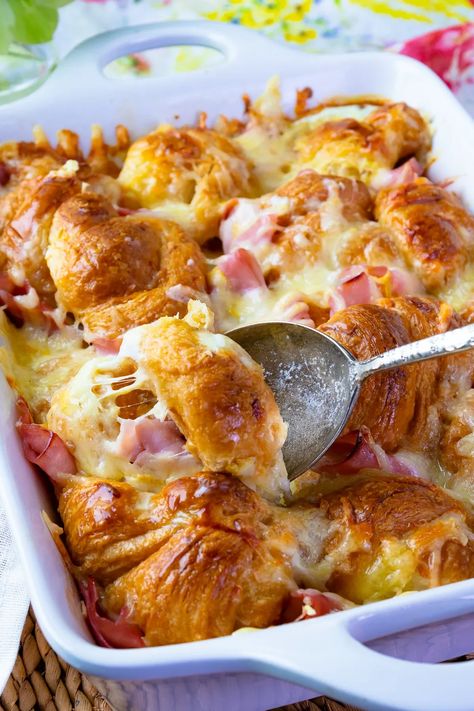 Buttery croissants, smokey ham, and gooey cheese are all baked together for the ultimate breakfast casserole. Inspired by the French classic, Croque Monsieur, this is an easy-to-make recipe that’s heavenly served with powdered sugar, jam and perfect for breakfast, brunch, and a must for the holidays.