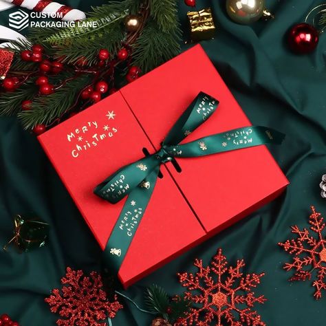 From shimmering ribbons to festive motifs, our packages are designed to make every present a celebration. Share the spirit of the season with beautifully wrapped surprises that sparkle with the warmth of Christmas! #customboxes #christmasboxes #christmasideas #custompackaging #designinspo #packagingideas #packagingsolution #designinspiration #custompackaginglane #packagingindustry2023 Hardbox Packaging, Christmas Gift Photography, Christmas Packaging Design, Christmas Food Photography, Xmas Hampers, Merry Christmas Poster, Gifts Photography, Christmas Shoot, Christmas Hamper