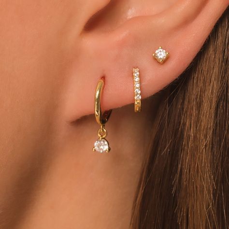 Dainty Everyday Earring Gift Set DETAILS: * Sterling Silver & 18K Gold Vermeil (strong plating over sterling silver) * A (hoop) - inner diameter - 9mm, length - 18mm * B (pave hoop) - inner diameter - 7mm * C (stud) - 3mm with butterfly backings * Nickel and lead free * Waterproof  * Tarnish resistant  * Hypoallergenic  * Lightweight * Can be worn 24/7 Each design sold as a pair (2 earrings) All earrings: https://www.etsy.com/shop/KaterynasJewelry?search_query=earrings Earring Ear Ideas, Ear With 3 Piercings, 3 Hoops Earrings, 4 Earrings In One Ear, Earring Sets For 2 Piercings, 3 Rd Piercing, Earring Stack Sets, Triple Earings Piercings, 3 Set Earrings Ideas