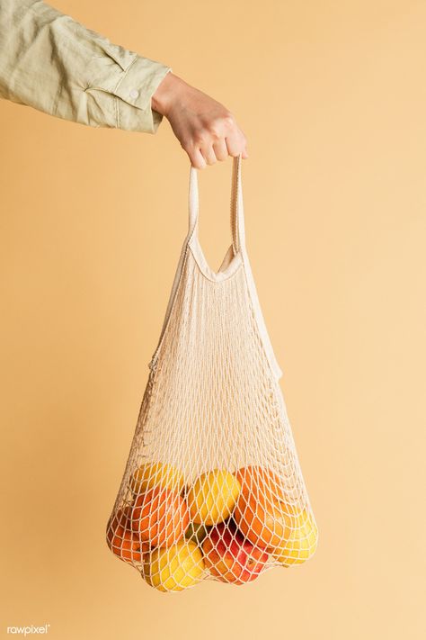 Hand holding a reusable net bag | premium image by rawpixel.com / Jira Plastic Bag Design, Plastic Cup With Straw, Blank Tote Bag, Fruit Bag, Blank Business Cards, Trending Images, Paper Balls, Hand Images, Bag Mockup