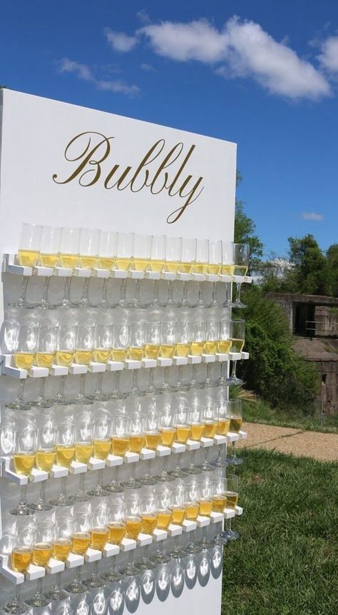 Champagne Glass Display Party Ideas, Mimosa Bar Wedding Reception, Welcome Drink Wall, Wedding Welcome Drinks Ideas, Welcome Drink Ideas Parties, Welcome Drink Ideas, Mimosa Wall, Bubbly Wall, Drinks Wall