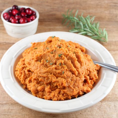 Mashed Sweet Potatoes are combined with coconut milk, cinnamon and fresh ginger for a healthy, vegan and paleo twist on traditional mashed potatoes. Paleo Mashed Sweet Potatoes, Vegan Mashed Sweet Potatoes, Mashed Sweet Potatoes Healthy, Paleo Thanksgiving Recipes, Elimination Diet Recipes, Sweet Potato Recipes Mashed, Thanksgiving Side Dishes Healthy, Paleo Thanksgiving, Christmas Side Dishes