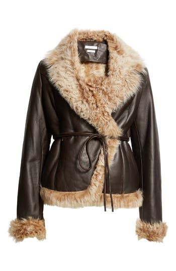 Plush shearling softens a chocolate-colored coat designed with a slender tie closure and peaked lapels. Front tie closure Peaked lapels Genuine shearling (Turkey) Dry clean Made in Turkey Designer Clothing Coat With Fur, Winter Coats Aesthetic, Shearling Coat Outfit, 90s Y2k Fashion, Winter Fur Coats, Saks Potts, Technology Fashion, Elegant Fall, Brown Coat