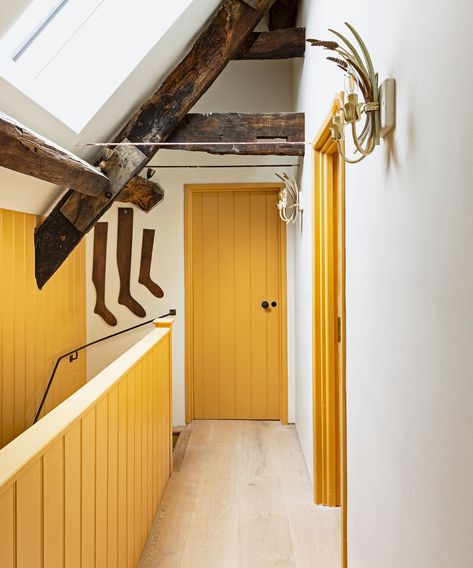 The world's best interior designers love using this color | Hallway Woodwork, Painted Woodwork, Emma Lewis, Edward Bulmer, Natural Paint, Tongue And Groove Panelling, Yellow Towels, Door Frames, Yellow Room