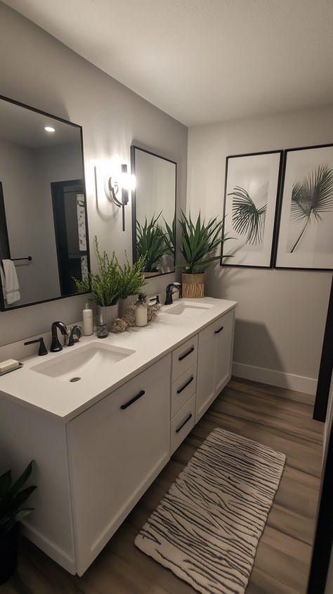 Embrace harmony with a Libra-inspired zen bathroom 🌿✨. Balanced colors and a symmetrical layout create serenity. Enjoy a spacious double vanity and peaceful artwork 🎨. Plant accents add a touch of nature, promoting tranquility in your personal oasis 🛁💚. Perfect for relaxation! Bathroom Decor For Two Sinks, His Hers Sinks Bathroom Ideas, His And Her Sink Decor Ideas, His And Hers Bathroom Ideas, Monochromatic Bathroom Ideas, Two Sinks Bathroom Ideas, Grown Woman Bathroom Ideas, Double Vanity Decor, His And Her Bathroom Ideas Decor