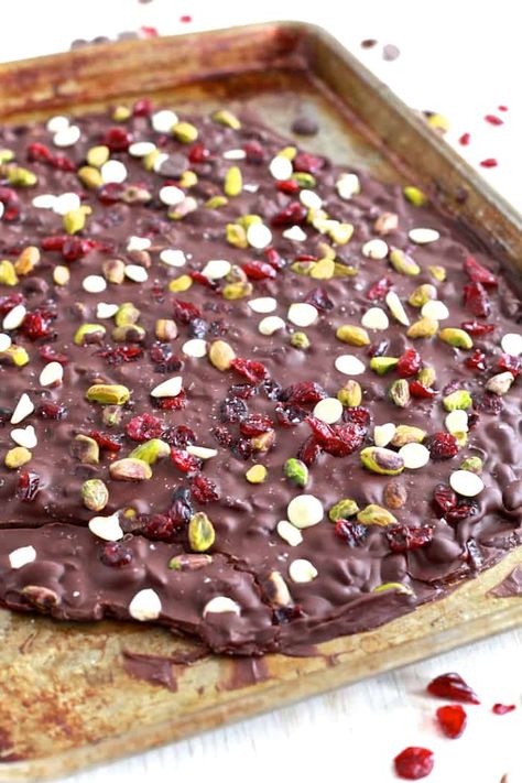 Pistachio and Cranberry Salted Chocolate Bark | TheNoshery.com Cranberry Bark, Pistachio Chocolate, Chocolate Bark Recipe, Chocolate Pistachio, Cranberry Pistachio, Space Stuff, Bark Recipe, Salted Chocolate, Chocolate Caliente