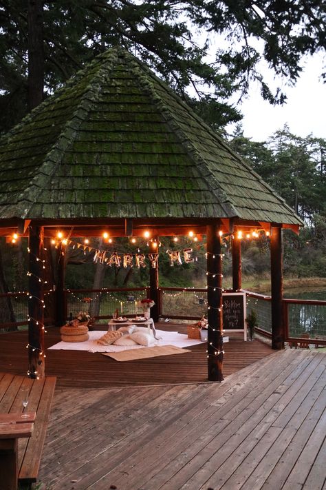 Pergola Proposal Ideas, Proposal With Pictures Hanging, Proposal Ideas Forest, Secluded Proposal, Woodsy Proposals, Fireplace Proposal, Outdoor Proposal Ideas Woods, Proposal Ideas Gazebo, Intimate Proposal Ideas Outdoor