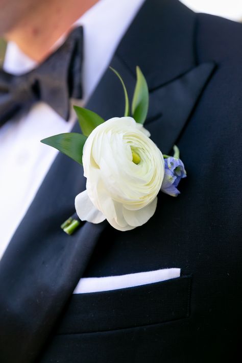 White Ranunculus Blue Delphinium Boutonniere, Boutineer Ideas Ranunculus, White Rose Blue Delphinium Boutonniere, Blue White Boutonniere, White Blue Boutonniere, Blue Delphinium Boutonniere, Boutonniere Wedding Blue, White And Blue Boutonniere, Blue And White Boutonniere