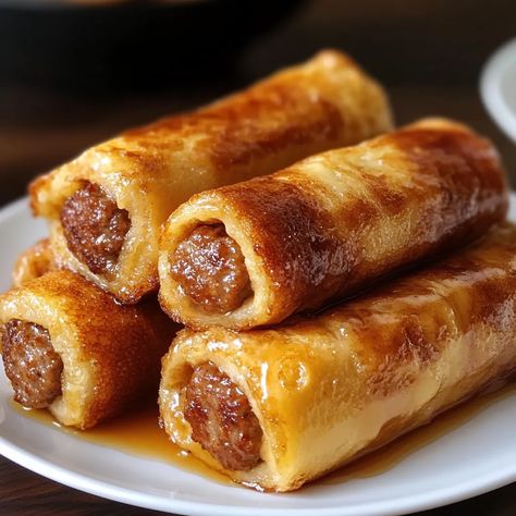 Learn how to make tasty Sausage French Toast Roll-Ups in minutes. A perfect breakfast recipe with sausages wrapped in French toast. Sausage Stuffed French Toast, French Toast Sausage Croissant, Sausage French Toast Roll Ups, Crescent Rolls Recipes Breakfast, French Toast Breakfast Sandwich, Sausage Link Breakfast Ideas, Breakfast Sandwiches, Crescent Roll Breakfast Recipes, French Toast Batter